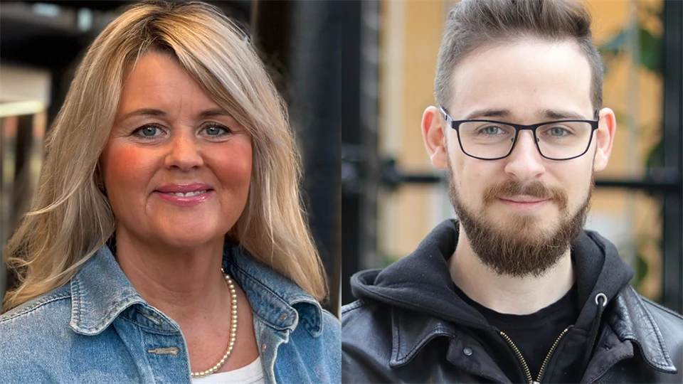 Kvinna med blont hår och mönstrad blus och mörkhårig man med glasögon och skägg