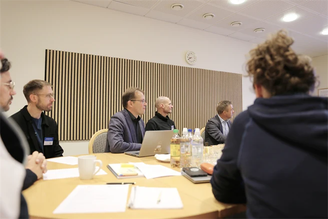 People around a table.