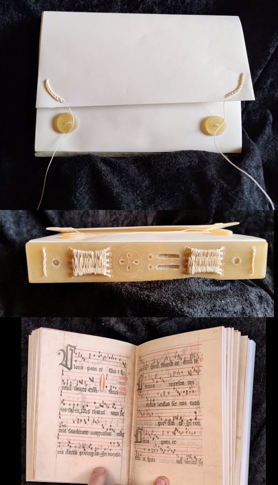 three books with black background