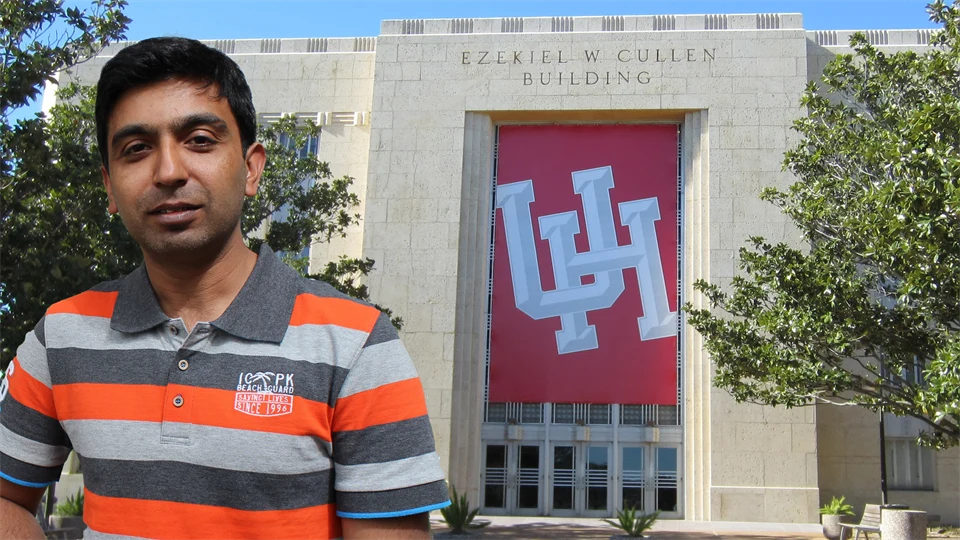 A man edited in front of University of Houston