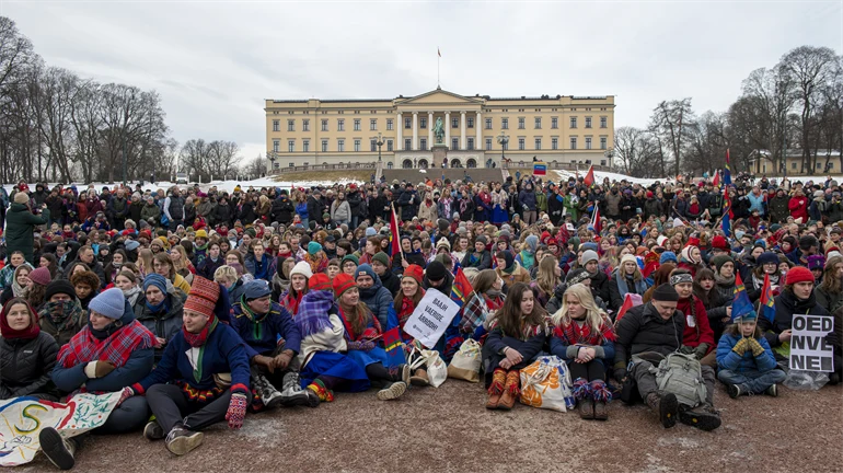 Protesters outside the royal castle in Oslo.