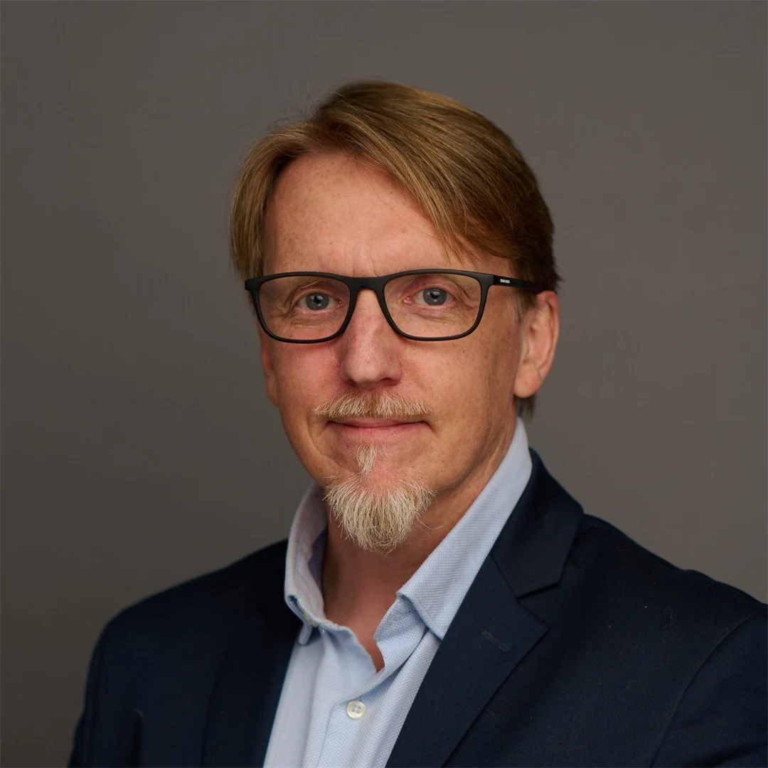 Porträttbild på en man.