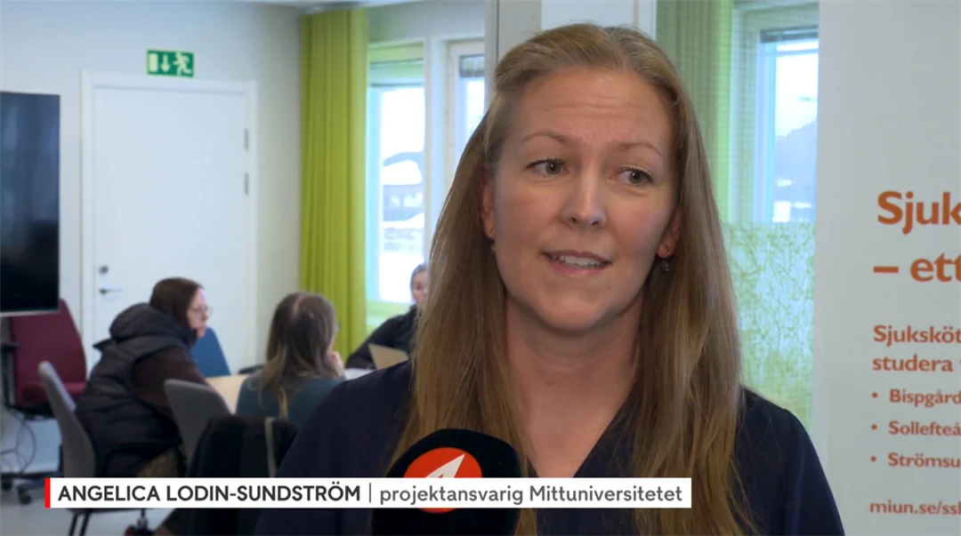 Kvinna blir intervjuad av TV-kanal.