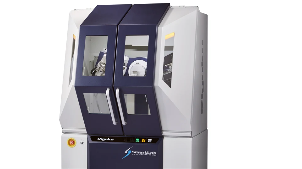 A white and dark blue machine for laboratories