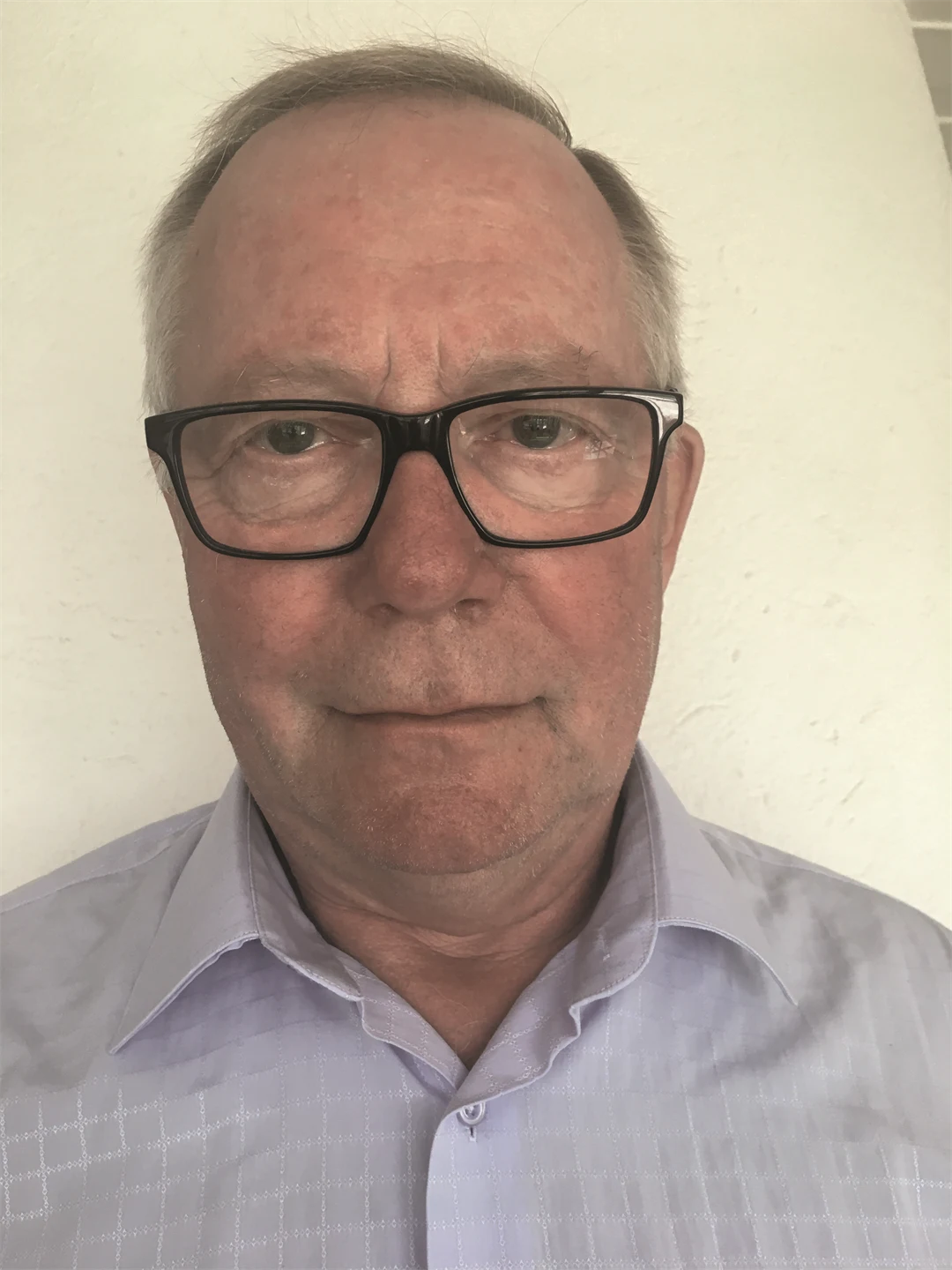 Porträttbild på en man.