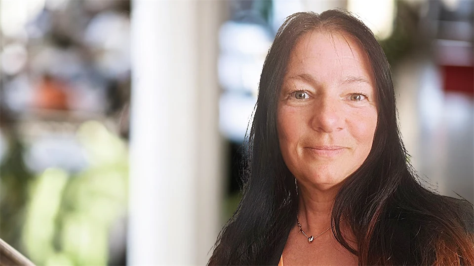a woman with long brown hair