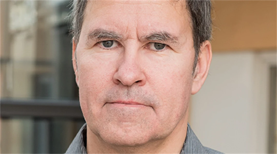 Porträtt av en man.