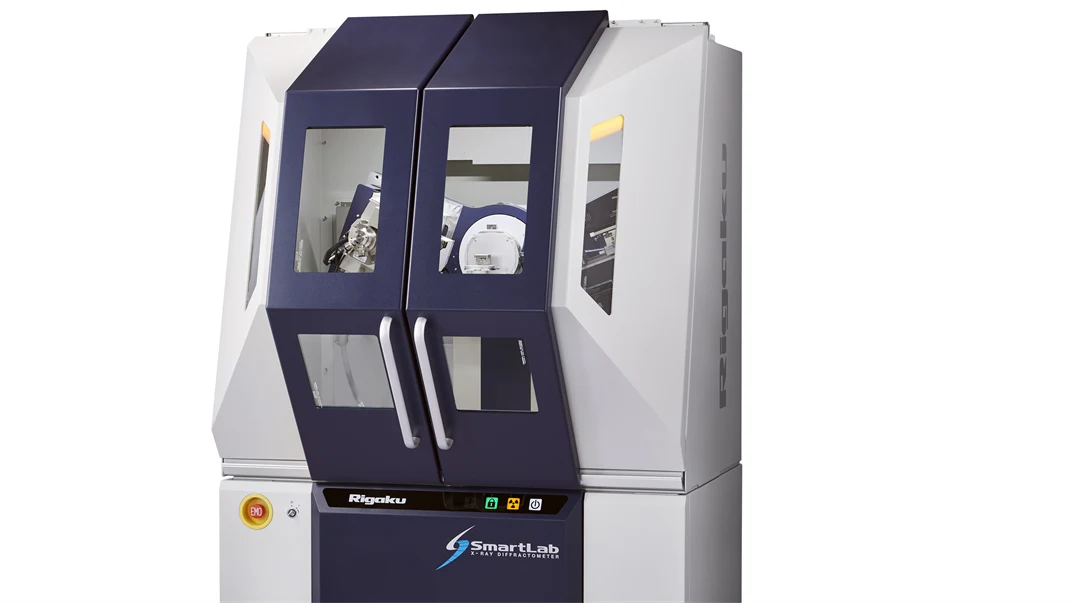 A white and dark blue machine for laboratories