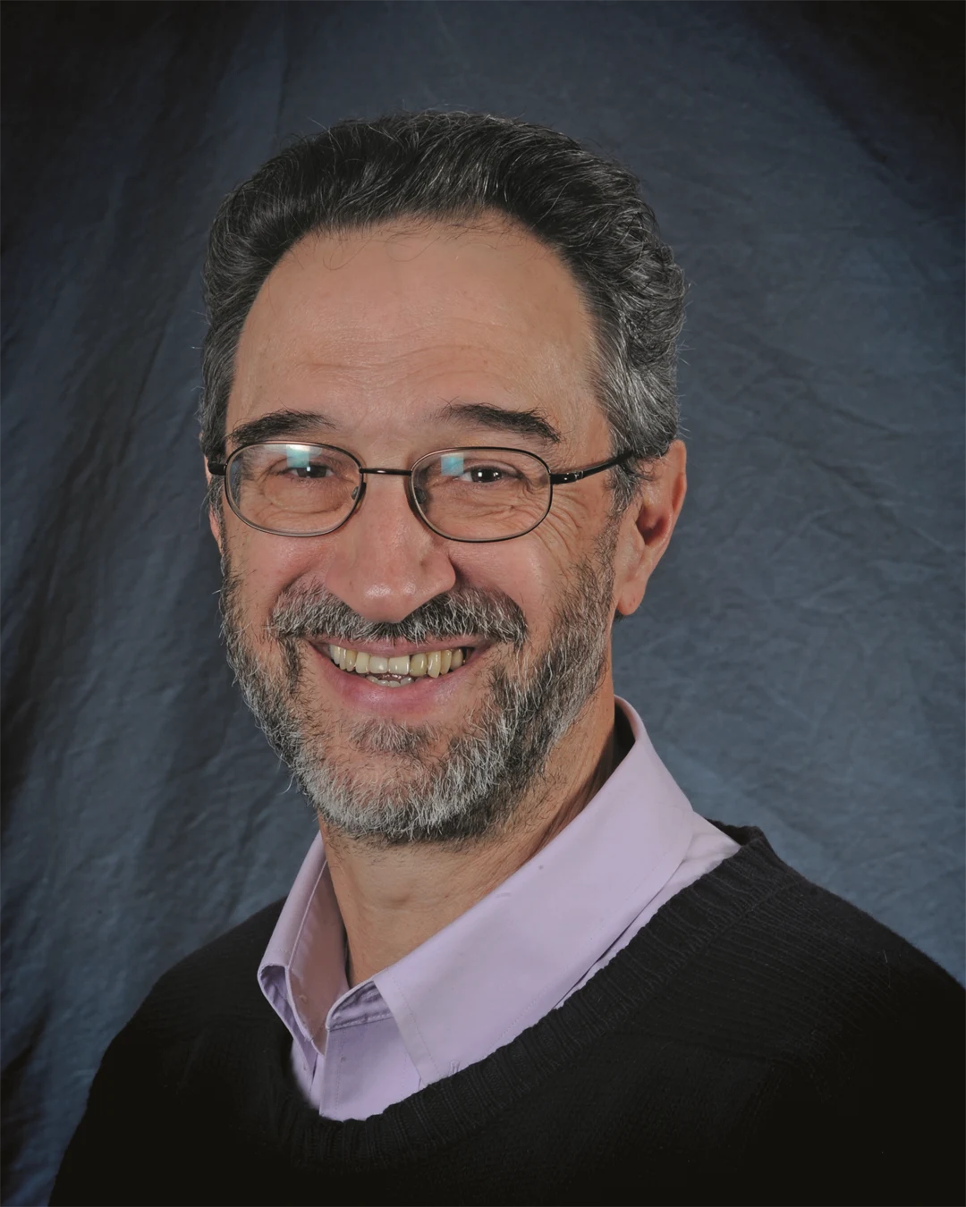 Porträttbild på en man.