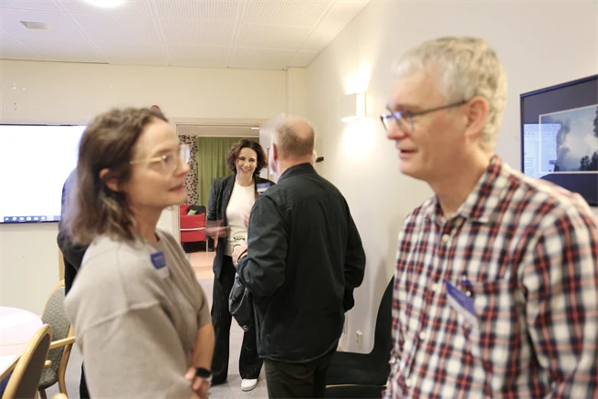 People engaged in conversation.