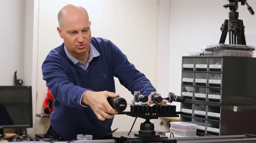 Mårten Sjöström working with a camera in the lab.