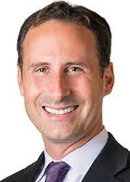 Porträtt av en man.