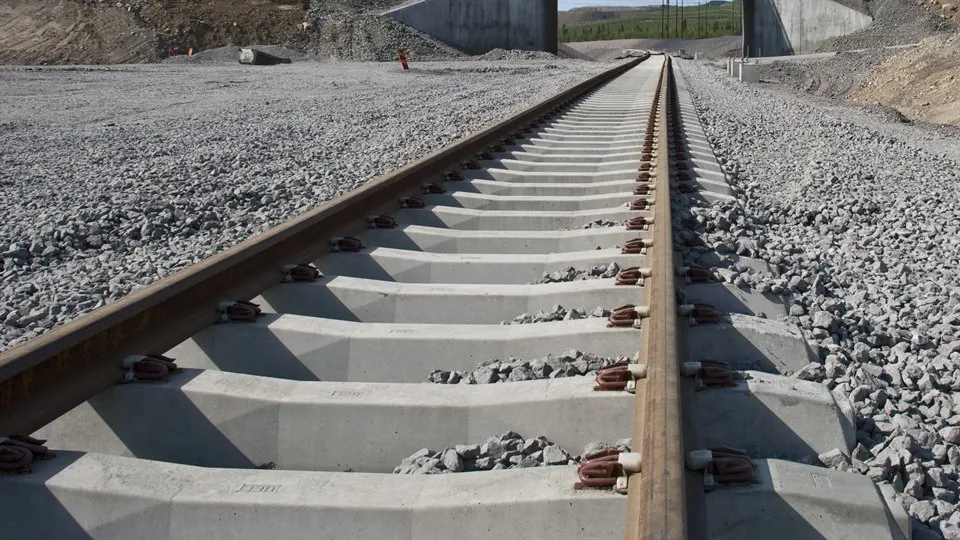 Railway surrounded by crushed stone.