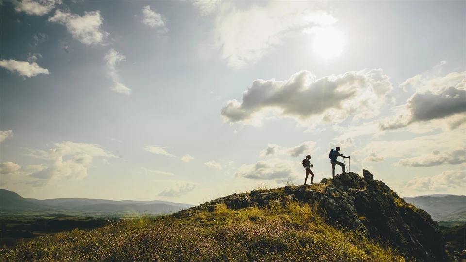 Hikers with backpacks on trail